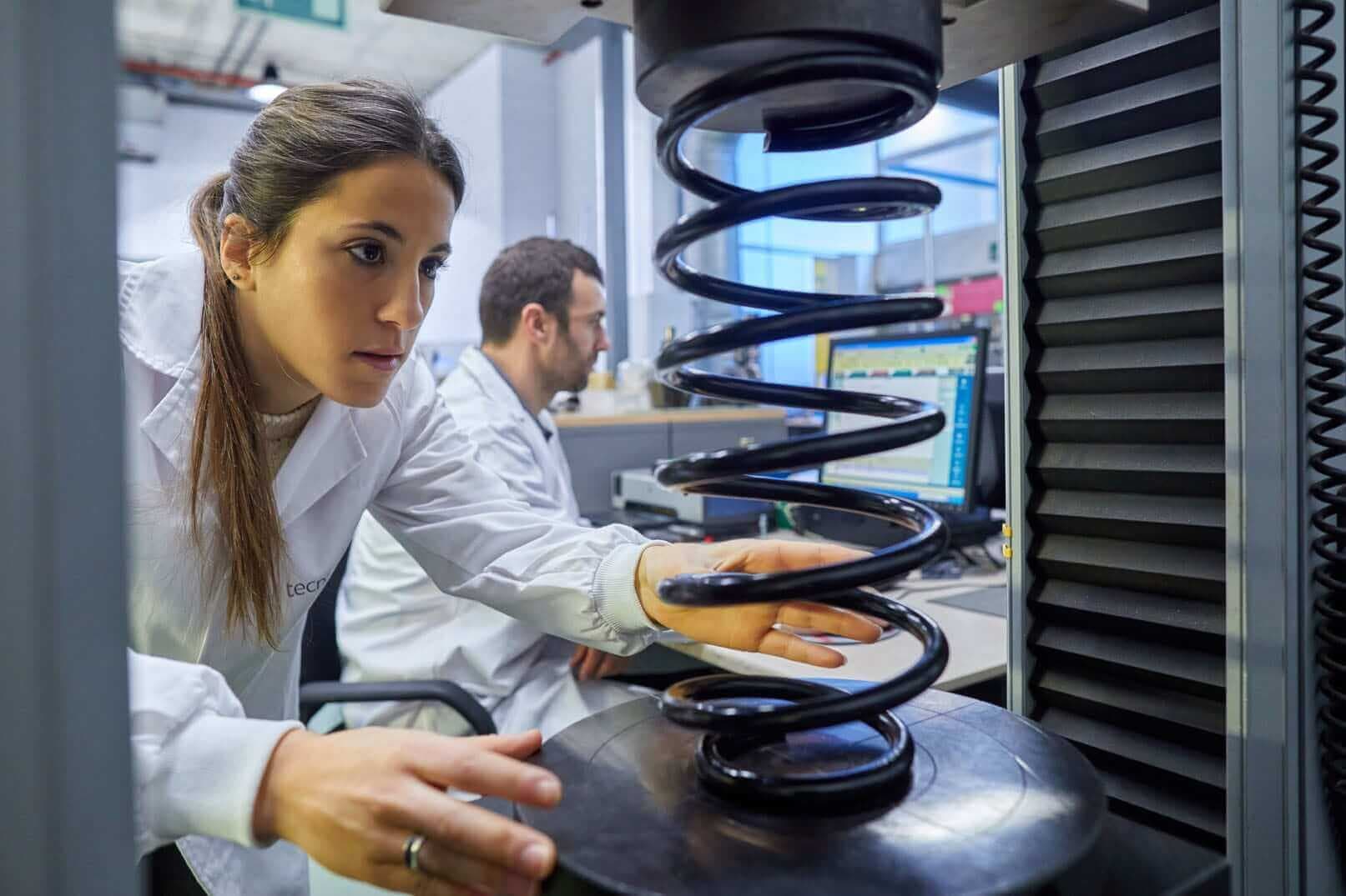 Researchers at work in a CNDE laboratory
